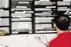 Staff member sorting mail.